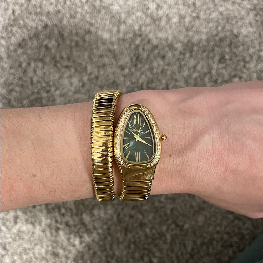 Gold Serpentine Watch with Green Dial